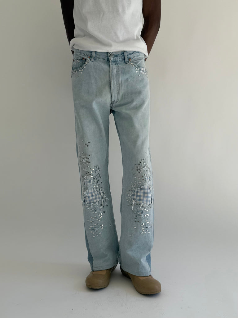 Light blue studded jeans