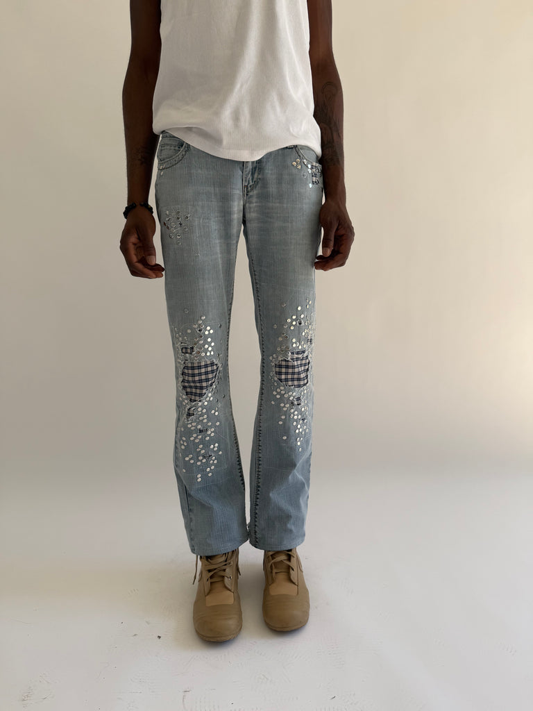 Light blue studded jeans