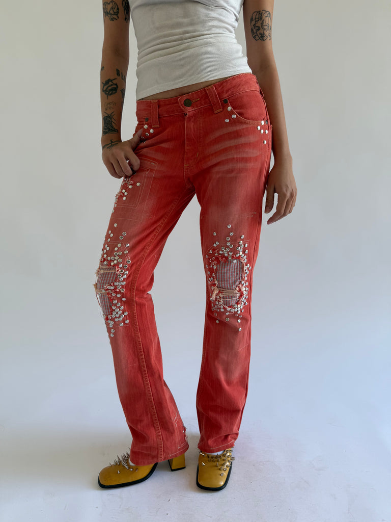 Coral studded jeans